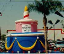 advertising inflatable - giant 25 ft. birthday cake balloon